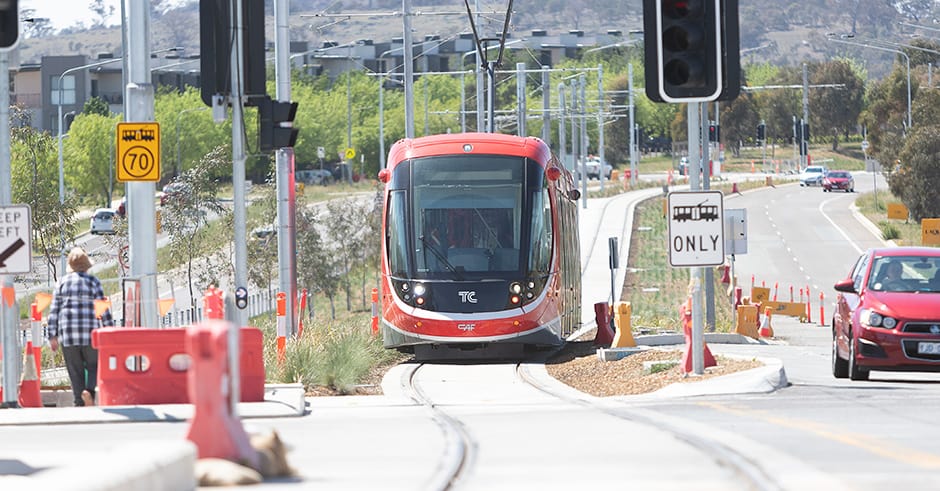 Canberra Metro light rail vehicle on track driving towards camera